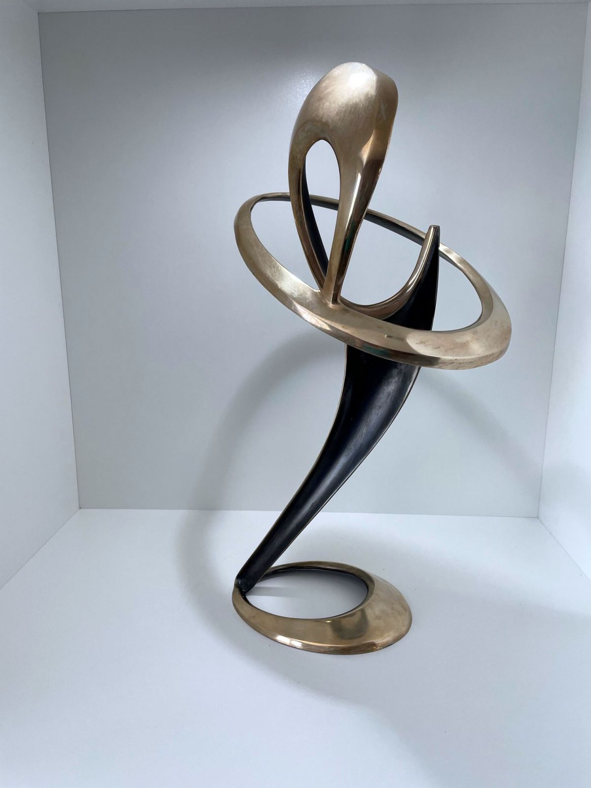 Herndon Fine Art offers authenticated Bob & Tom Bennett fine art, including rare polished bronze sculptures, limited edition castings, and abstract metalwork.